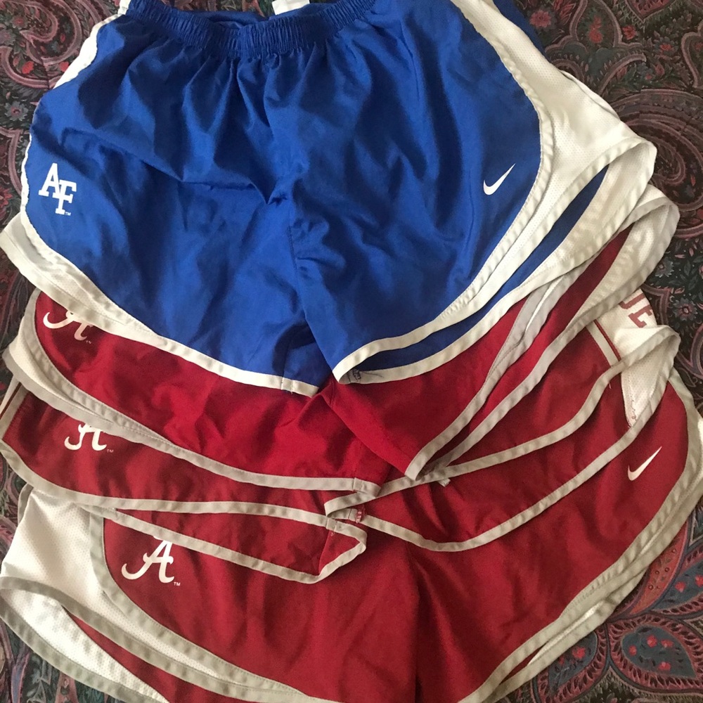 4 women’s Nike running/workout shorts